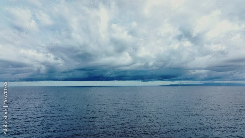 Atmospheric Clouds On The Horizon Over The Ocean, Aerial View Atmospheric Clouds On The Horizon Over The Ocean, Aerial View