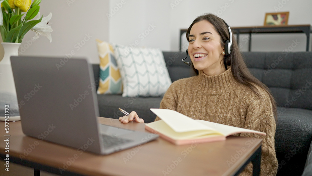 Young beautiful hispanic woman smiling confident having video call at home Young beautiful hispanic woman smiling confident having video call at home