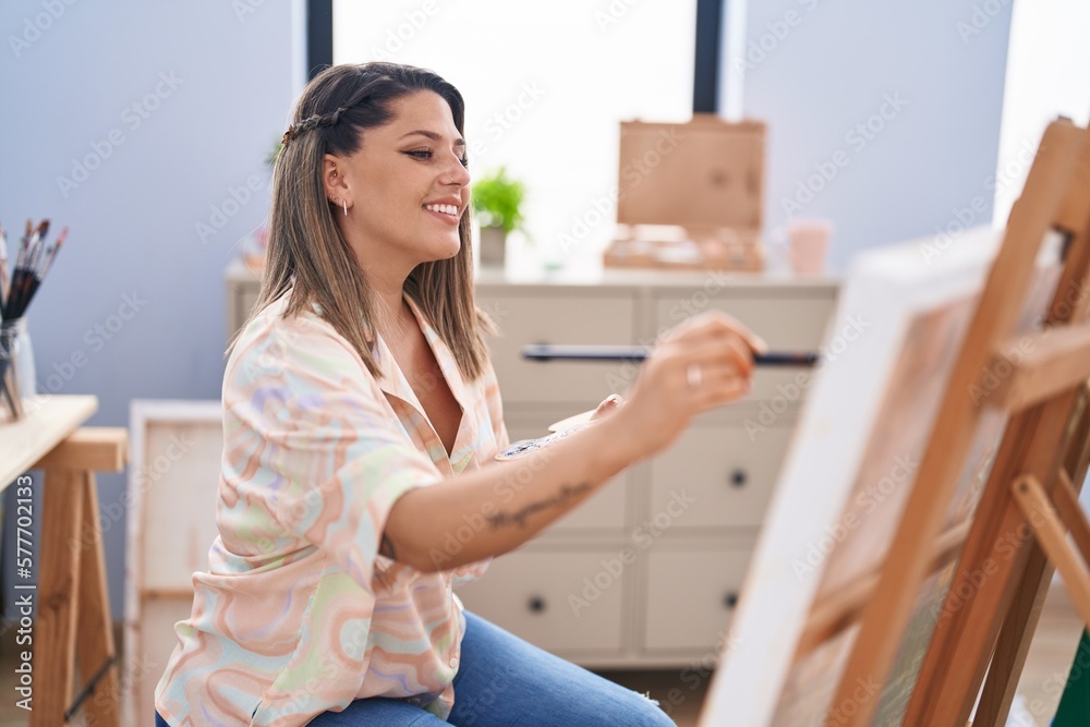 Young hispanic woman artist smiling confident drawing at art studio Young hispanic woman artist smiling confident drawing at art studio