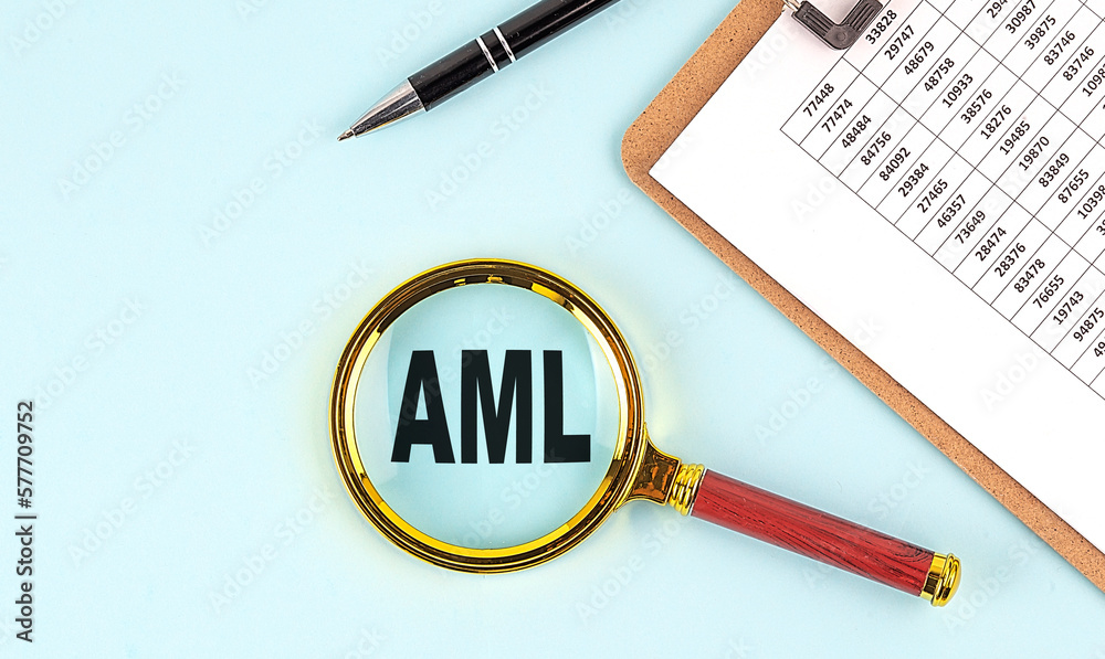 AML text on magnifier with clipboard on blue background AML text on magnifier with clipboard on blue background