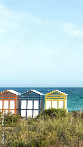Famous wooden beach cabins in Sagaro with Playa de Sant Pol, Costa Brava. Spain. Mediterranean Sea photo