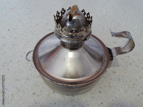 Kerosene lamp on a white background.