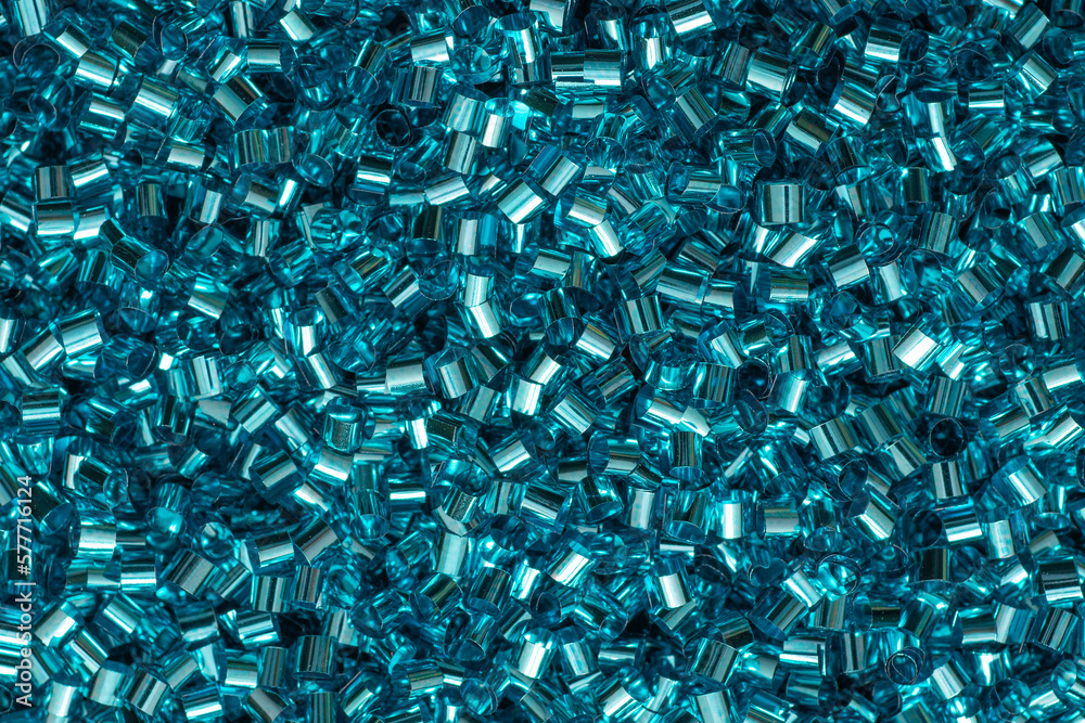 Confetti made out of foil shreds. Blue metallic background Stock Photo