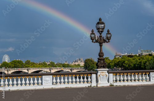Bridge Pont Alexandre III Over River Seine With Colorful Rainbow in Paris, France