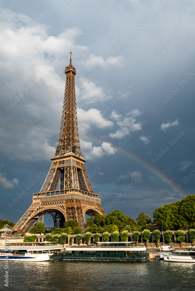 Fototapeta premium Famous Eiffel Tower (Tour Eiffel) With Rainbow And River Seine In The Capital Of France Paris