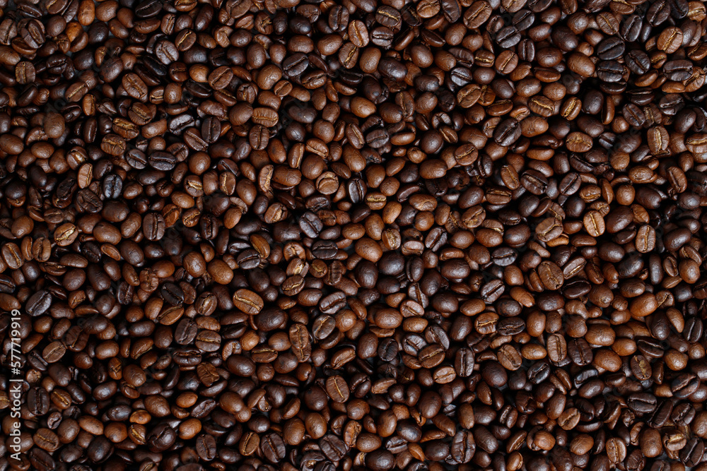 photo macro close up texture of roasted coffee beans dark, can be used as a background. photo macro close up texture of roasted coffee beans dark, can be used as a background.