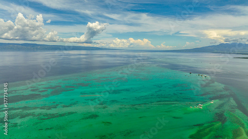 Aerial view of sandbar in the blue sea. Seascape with Manjuyod sandbar. Negros, Philippines.