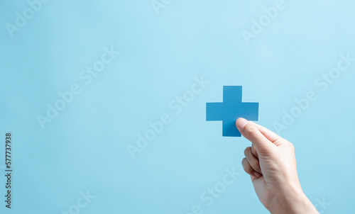 Fototapeta Naklejka Na Ścianę i Meble -  Health insurance concept. people hands holding plus and healthcare medical icon, health and access to welfare health concept.