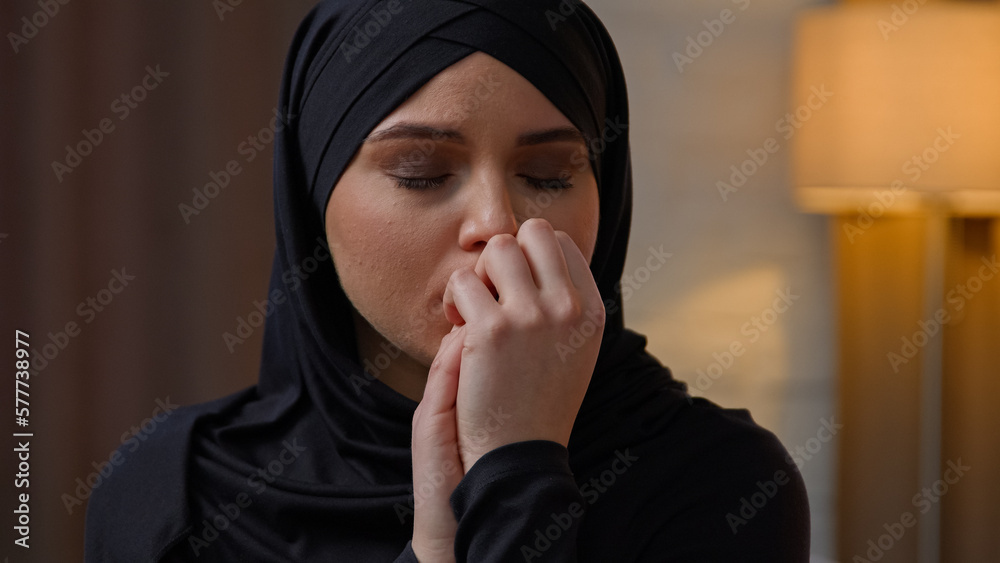 Sad disappointed upset crying arabian muslim arabian woman multiracial girl lady sit indoors home apartment anxious girlfriend cry alone worry about breakup relation crisis health problem hurt grief Sad disappointed upset crying arabian muslim arabian woman multiracial girl lady sit indoors home apartment anxious girlfriend cry alone worry about breakup relation crisis health problem hurt grief