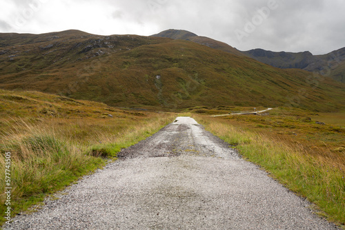 road in the mountains in the highlands, scotland, wet floor,