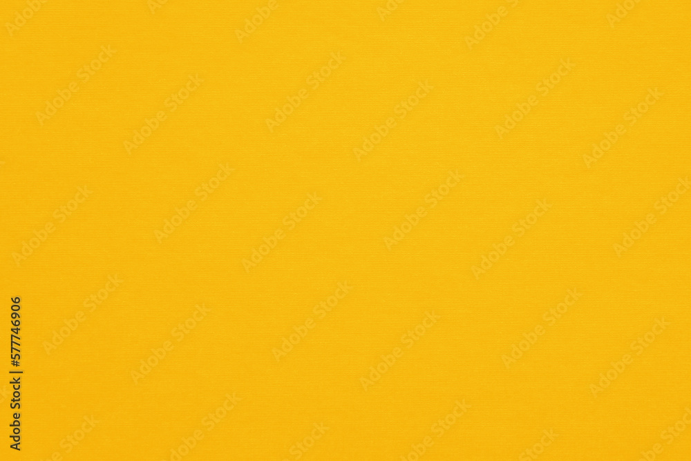 Texture of yellow fibrous paper, cardboard, close-up. Paper background, embossed surface. Texture of yellow fibrous paper, cardboard, close-up. Paper background, embossed surface.