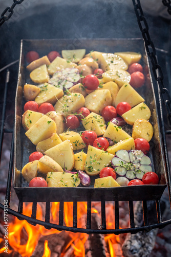Roasted potatoes on grill w...