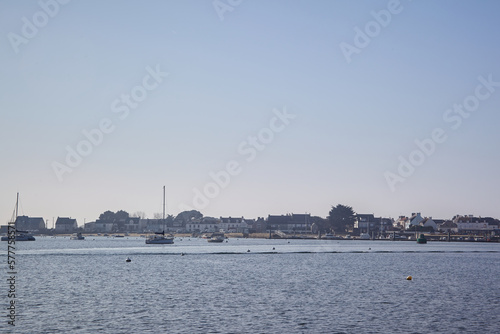 Port Louis, Bretagne, France : Beautiful view of Gâvres from Port Louis, very sunny day, boat on the sea © Lola