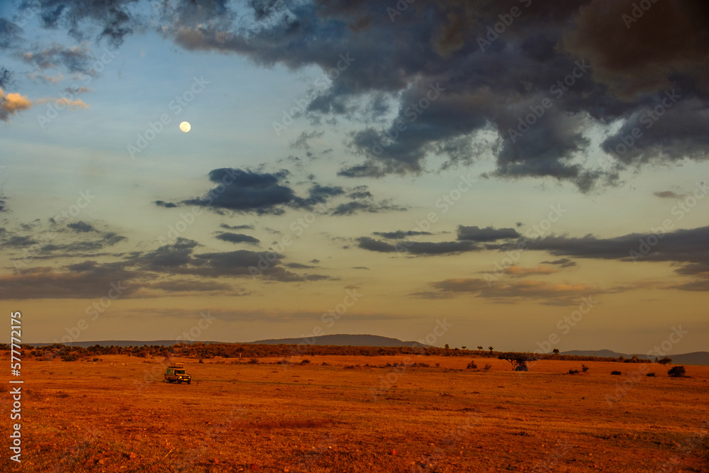 Moon over red desert