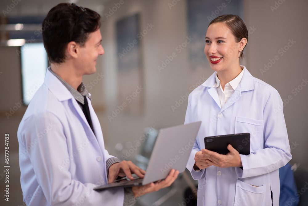 Healthcare professionals discussing in hospital. Medical staff during morning briefing in boardroom Healthcare professionals discussing in hospital. Medical staff during morning briefing in boardroom