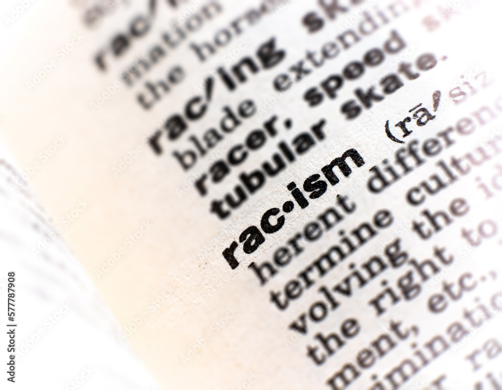 closeup of the word racism - obrazy, fototapety, plakaty 