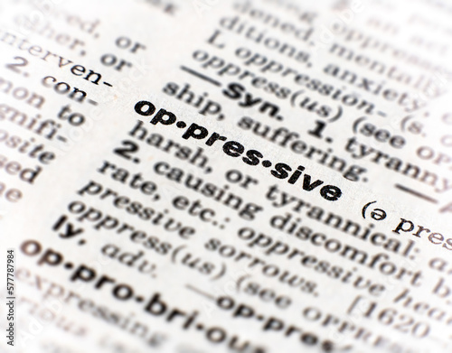 Closeup of the word oppressive