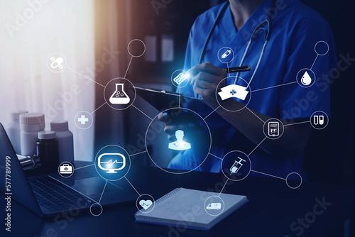 Medicine doctor working with digital medical interface icons on the hospital background, healthcare and Medical technology and network concept.