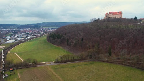 Aerial around the village Lauchheim and castle Kapfenburg on a cloudy day in late winter photo