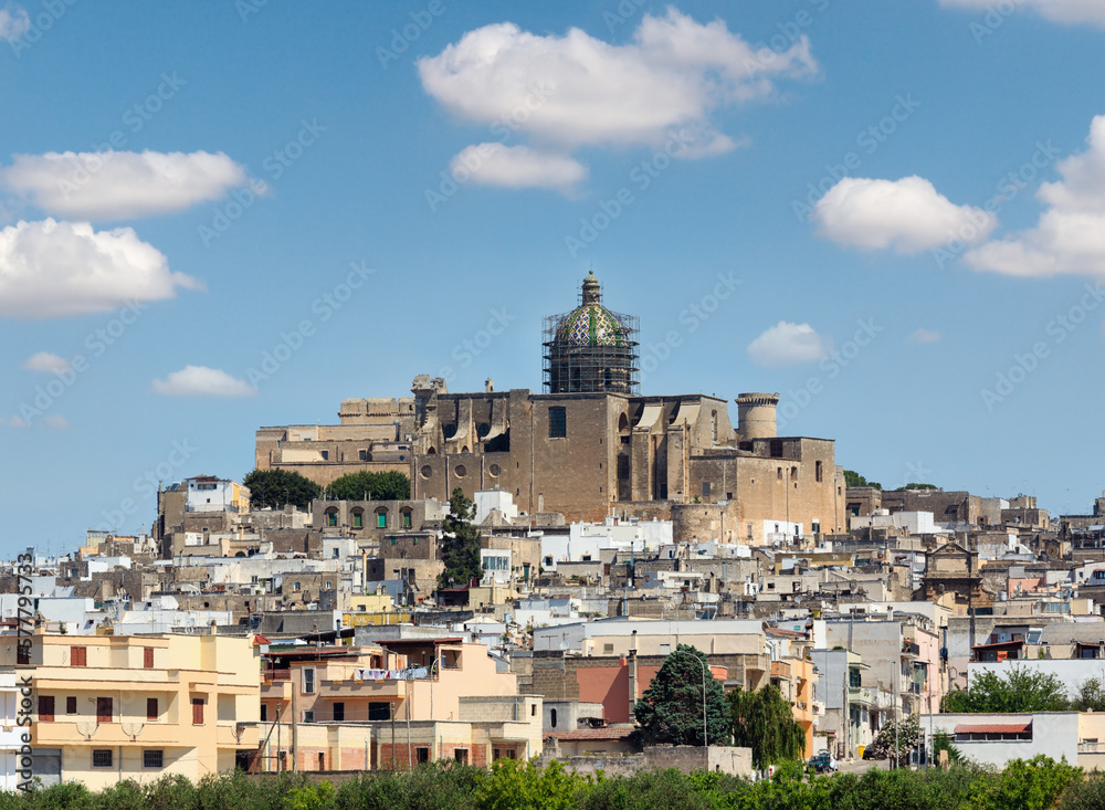 Small picturesque medieval town Oria panoramic view, Brindisi region, Puglia, Italy. Roman Catholic Diocese of Oria in fortress on top.