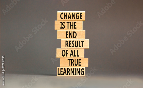 Change symbol. Concept words Change is the end result of all true learning on wooden blocks. Beautiful grey table grey background. Copy space. Motivational business change result concept.