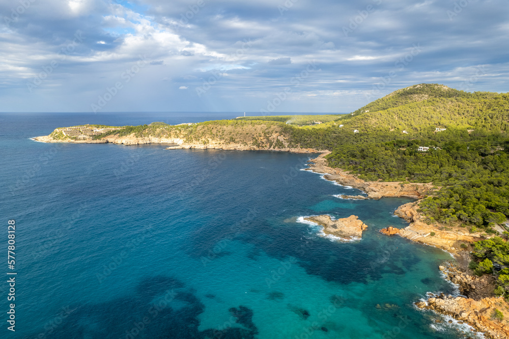 Fototapeta premium Aerial photographs of the beaches of Cala Xarraca , on the island of Ibiza during a sunny summer day with blue sky and turquoise water