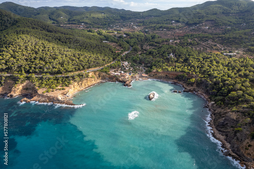 Aerial photographs of the beaches of Cala Xarraca , on the island of Ibiza during a sunny summer day with blue sky and turquoise water