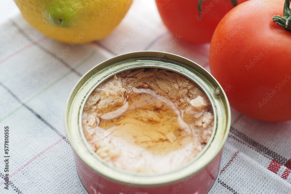 canned tuna on wooden table , canned tuna on wooden table ,