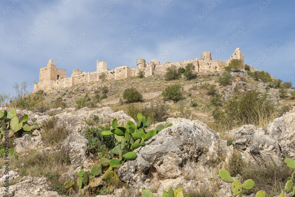 Ruins of the castle of Moclin high on the mountain on a clear summer day in Granada.