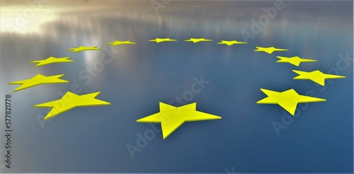 Yellow stars of European Union on the blue water against the blurred sunny sky. Suitable illustration for political websites. photo