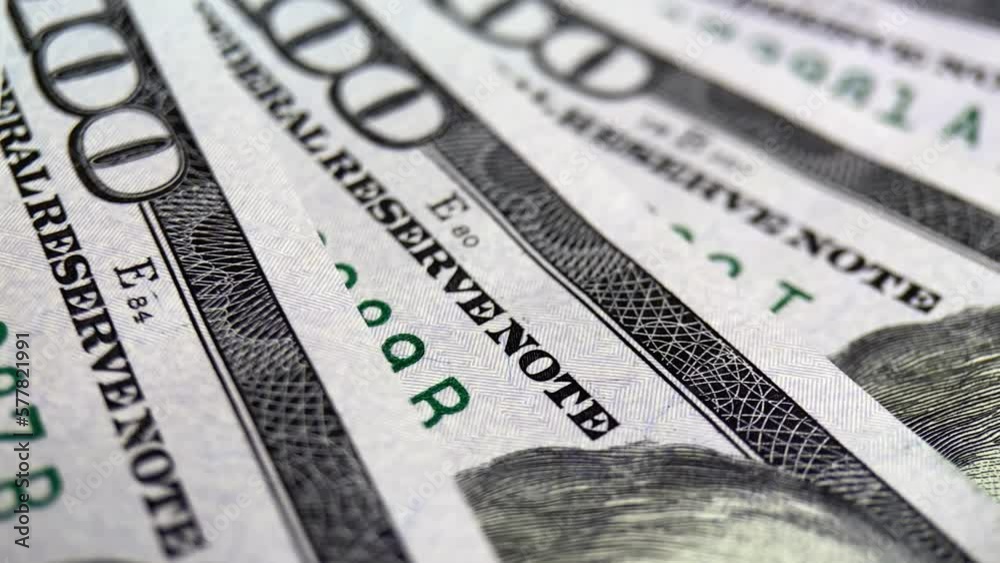 Macro many 100 american dollar bills. Cash money banknotes. Franklin's face texture. Finance and investment concept. Closeup shot. Currency exchange of one hundred usd. Rich business economy of usa Macro many 100 american dollar bills. Cash money banknotes. Franklin's face texture. Finance and investment concept. Closeup shot. Currency exchange of one hundred usd. Rich business economy of usa