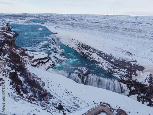 a huge winter waterfall in Iceland photo