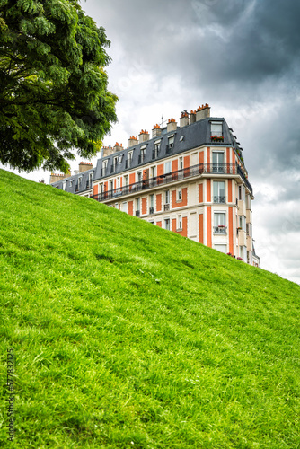 Typical Paris house behind the hill, France