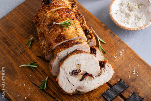 Fényképezés Roasted pork loin stuffed with cranberry and apples