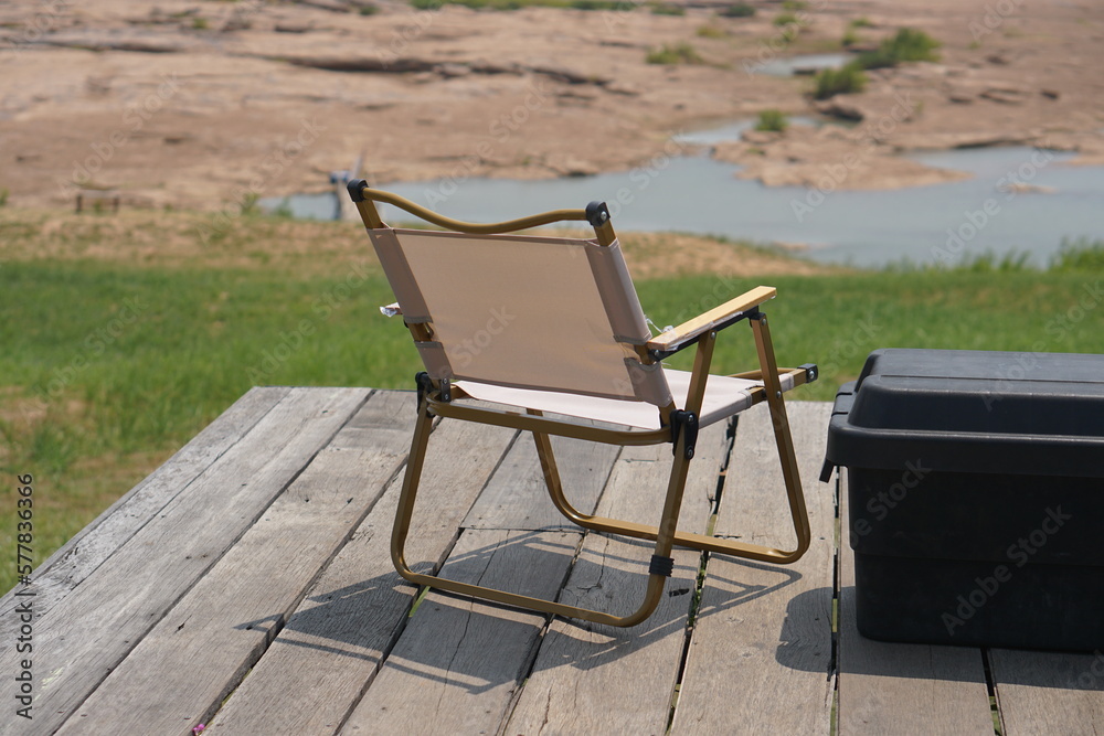 Camping chair on old wooden floor