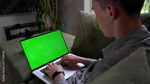 Mans hands of business woman. User worker using typing on laptop notebook keyboard. Sit at home sofa working online with pc. Technology concept. Close up side view. Video 4K.