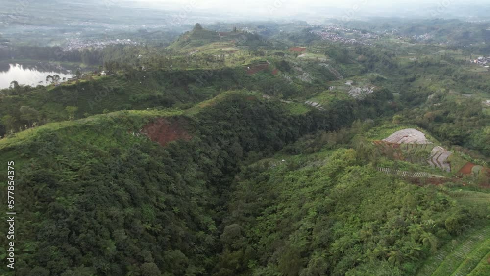 Hill side farm at Mount Dieng Aerial view Hill side farm at Mount Dieng Aerial view