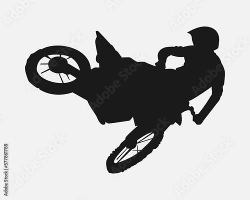 silhouette of a motocross racer doing freestyle, jumping. extreme sport concept, vehicle.