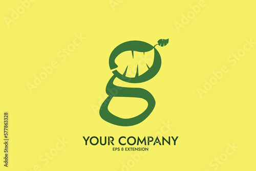 logo letter g green jaw fangs with leaf isolated on yellow background. Can be used for Branding and Nature Logos. Flat Vector Logo Design Template Element. eps 8 extension