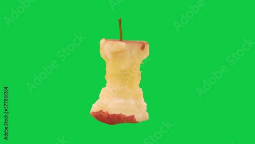 Stop motion animation Red yellow apple spinning and taking a bite on chroma key green screen background, Alpha Channel.