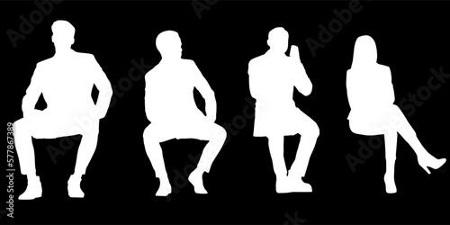 Set of silhouettes of men and a women, a group of sitting people white color isolated on black background
