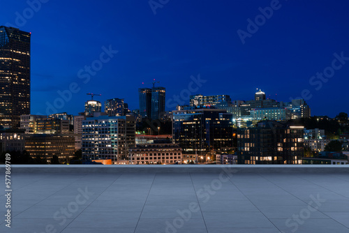 Skyscrapers Cityscape Downtown, Seattle Skyline Buildings. Beautiful Real Estate. night time. Empty rooftop View. Success concept.