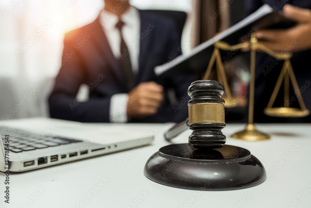 team meeting.businessman discussing legal legislation at law firm. judge gavel team meeting.businessman discussing legal legislation at law firm. judge gavel