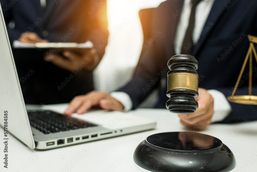 team meeting.businessman discussing legal legislation at law firm. judge gavel team meeting.businessman discussing legal legislation at law firm. judge gavel