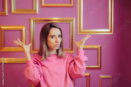 Billede på lærred Creative Woman Feeling Mind-blow in front of some Empty Frames