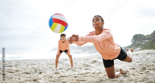 Volleyball, sports and teamwork of women at beach hitting ball in competition, game or match mockup. Training, exercise and girls, players or friends play for workout, fitness and health at seashore.