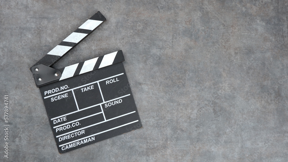 Photo of a Clapper board with a gray background, suitable for mock ups on entertainment and film themes and others in landscape format