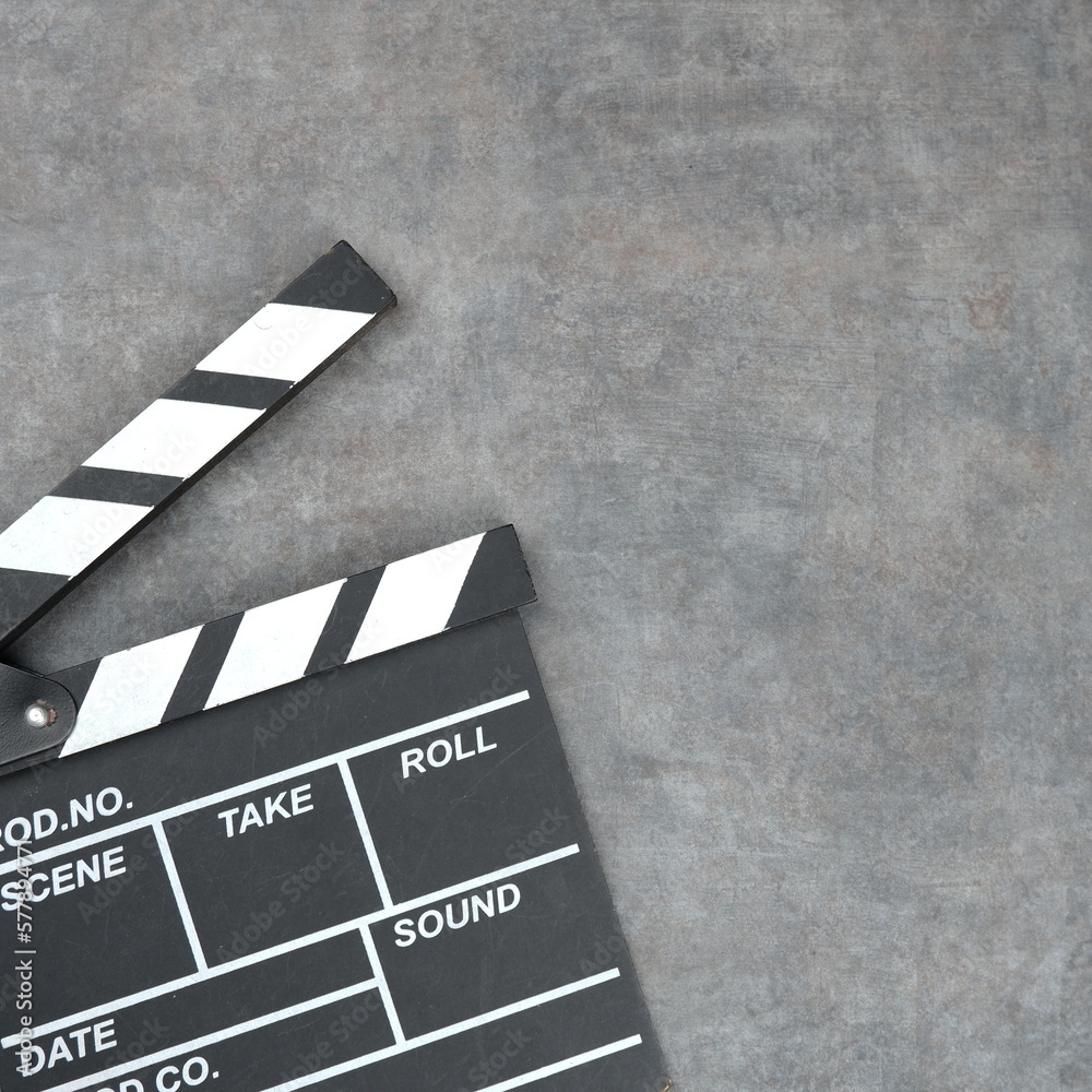 Photo of a Clapper board with a gray background, suitable for mock ups on entertainment and film themes and more
