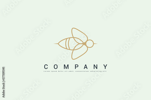 golden bee logo on white background