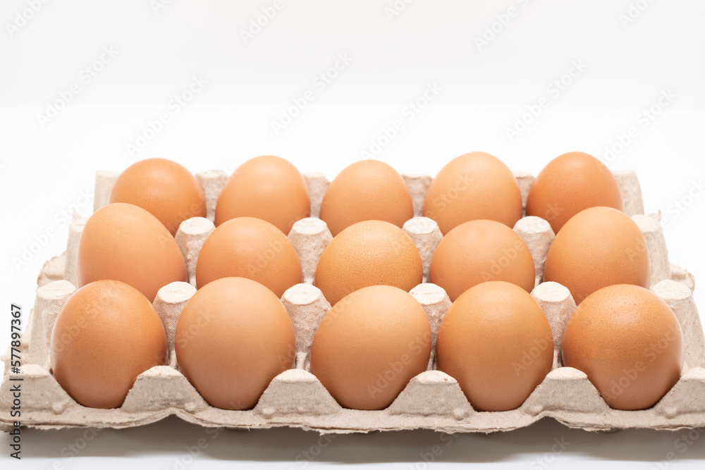 Brown eggs in an egg carton, close-up selective focus Brown eggs in an egg carton, close-up selective focus